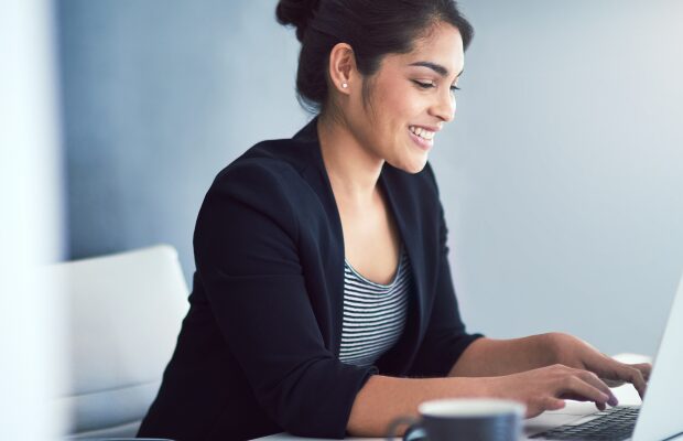 Self-employed, freelancer and business woman with laptop for typing, research and article info.